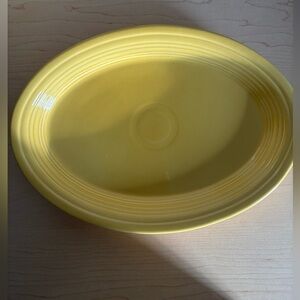 NEW and never used Fiesta Platter, Sunflower Yellow, 14”long x 10” wide. Lovely!